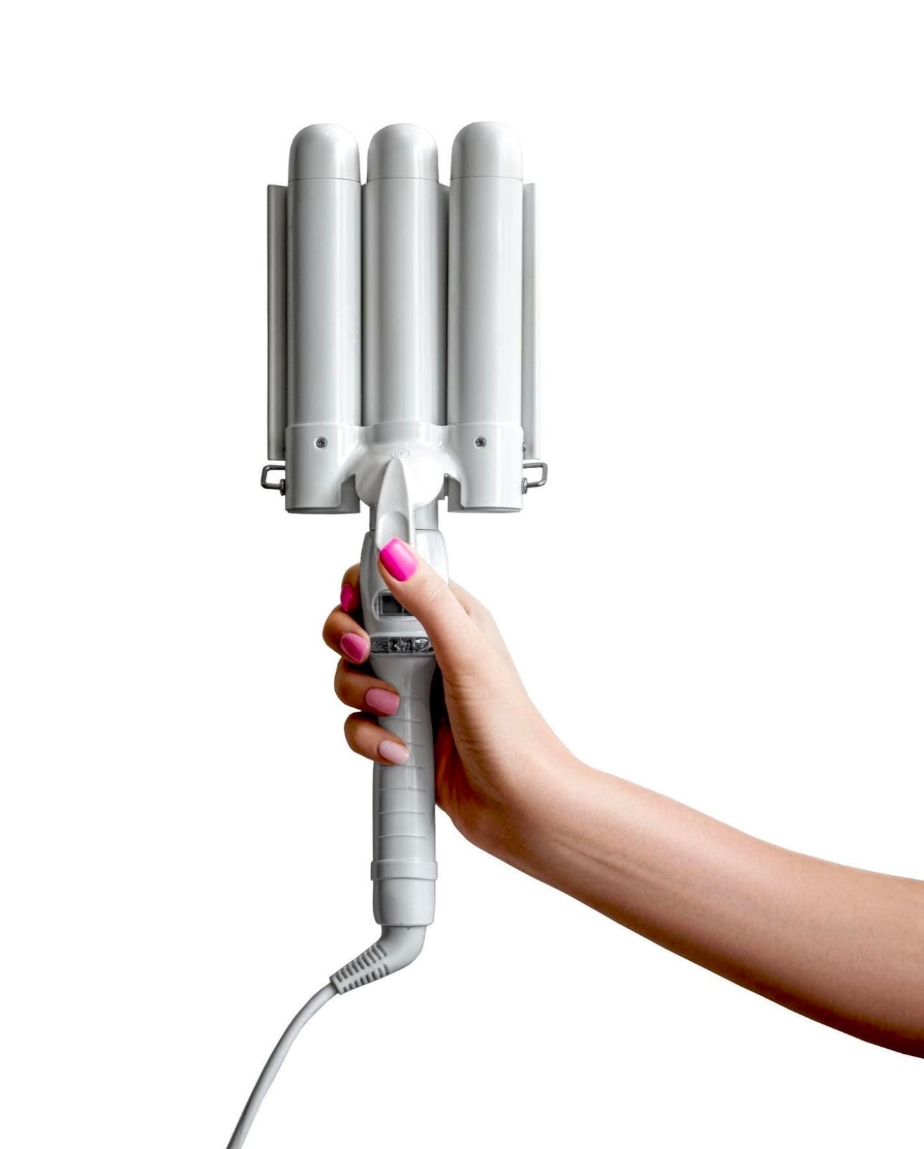GlamJunkie Iconic Waver Hair Tool shown in hand against a plain white background. Create luxurious waves in minutes.